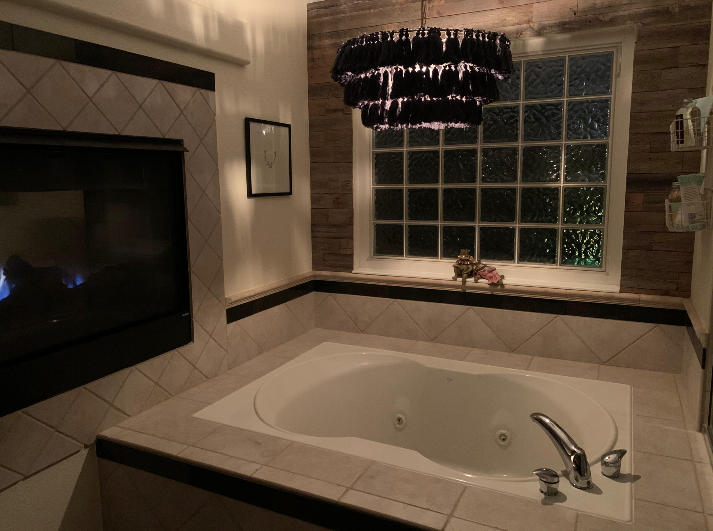 Primary bath with gas fireplace and jetted tub
